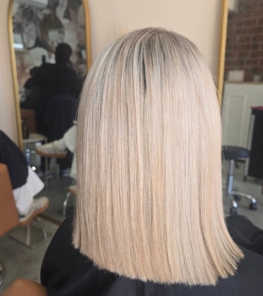 Cool sleek blonde by The Hair Space