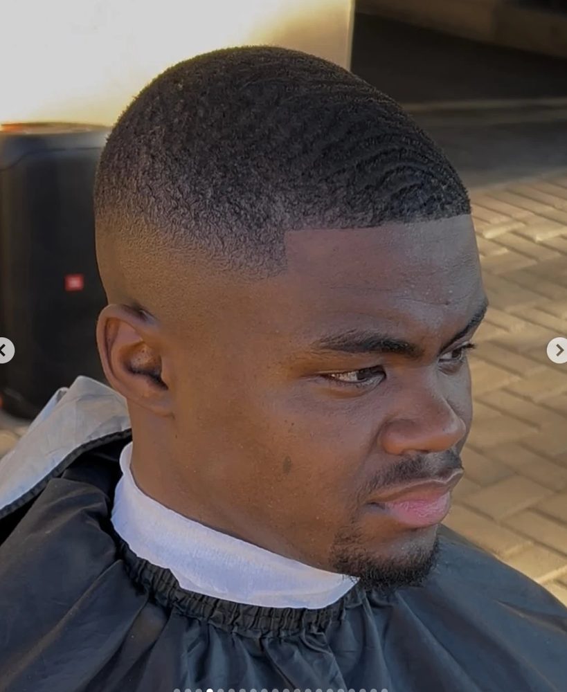 Crisp buzz cut with sharp line-up