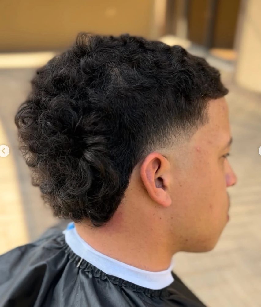 Curly top with drop fade