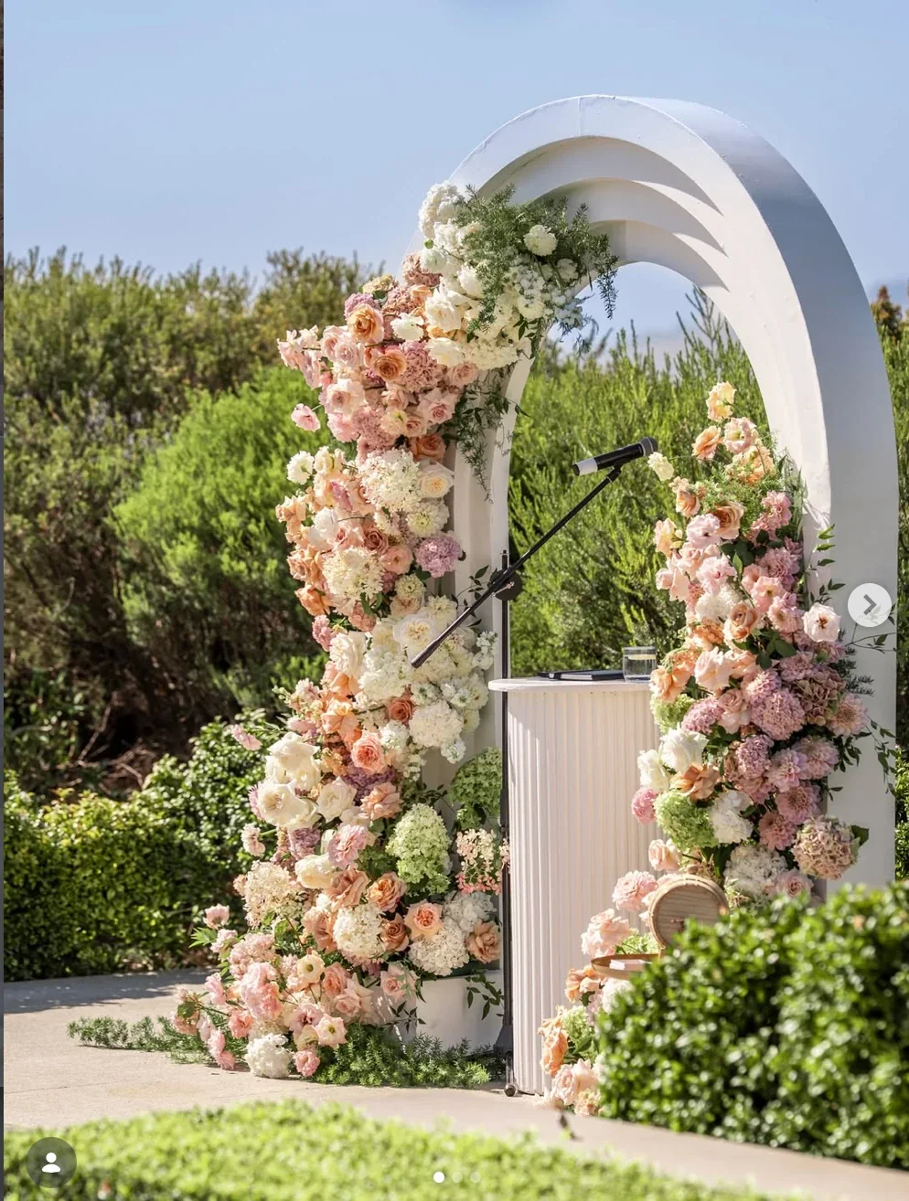 Floral ceremony arch installation