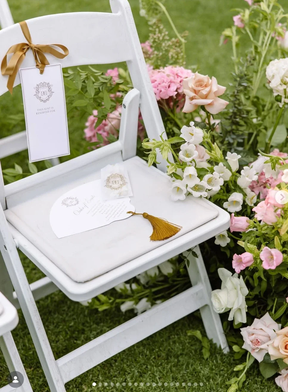 Wedding chair styling with florals and stationery